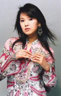 剧照-伊能静披清装一改淑女路线 演反派难以自拔(图)